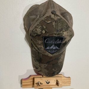 Cabela’s camo hat, mesh, snapback cap. One size fits most.
